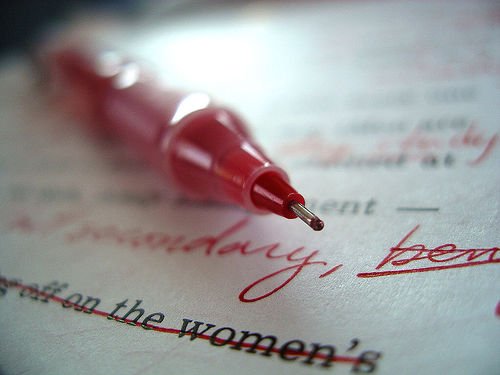 red pen and text