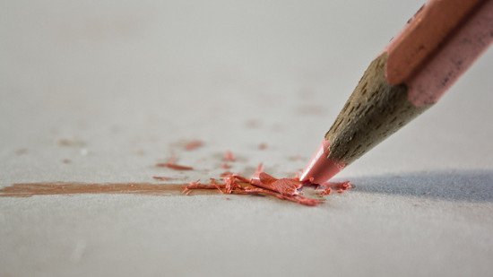 A pink pencil with pink lead has a broken tip. By Hernán Piñera via Flickr.
