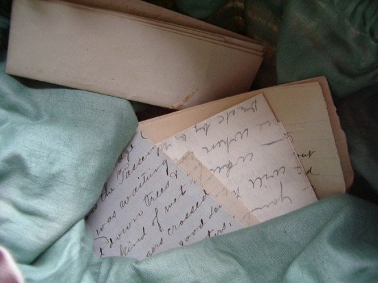 several old, handwritten letters in a loose stack