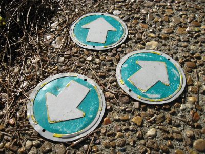 Markers pointing in different directions