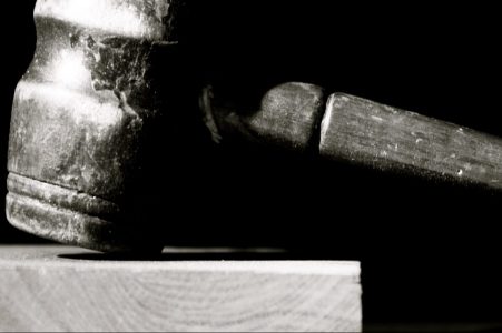 Image: black and white photo of a gavel