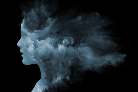 Image: an illustration of a young woman's face in profile, in which the outline of her face is clear but the rest of her head and neck dissipates into a swirling cloud against a black background.